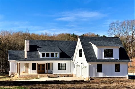 white vinyl siding farmhouse